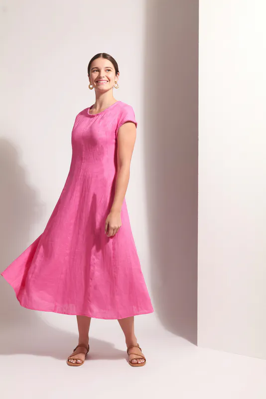 Model wearing Pink Festival Event Dress By Foil Available at Beetees Nelson