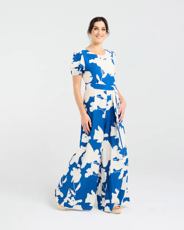 Model wearing Blue Aztec Juliana Tie Waist Jumpsuit By Blackstone Available at Beetees Nelson