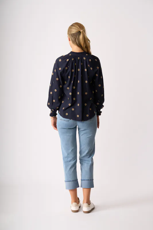 Model wearing Navy Spot Just Chillin' Top By Oh Three Available at Beetees Nelson