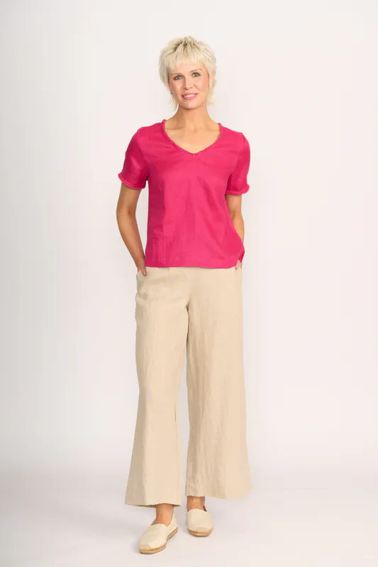 Model wearing Pink V Benefits Top By Foil Available at Beetees Nelson