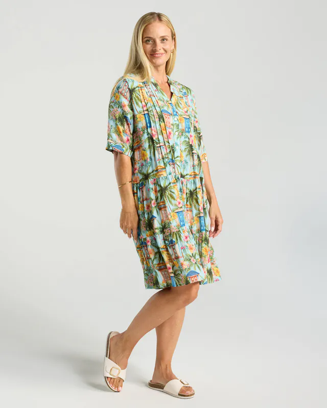 Model wearing Emerald Cross Dye Rosanna Short Tiered Dress By Blackstone Available at Beetees Nelson