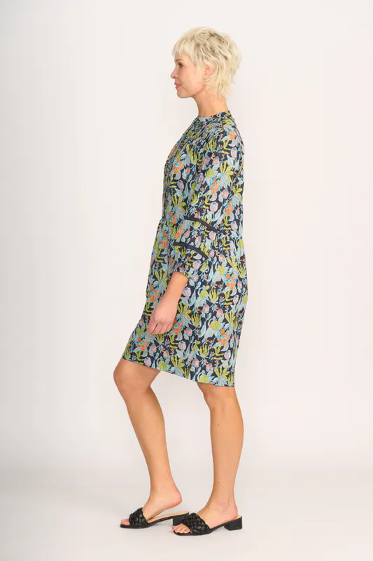 Model wearing Navy Floral Pintuck & Lace Dress By Foil Available at Beetees Nelson