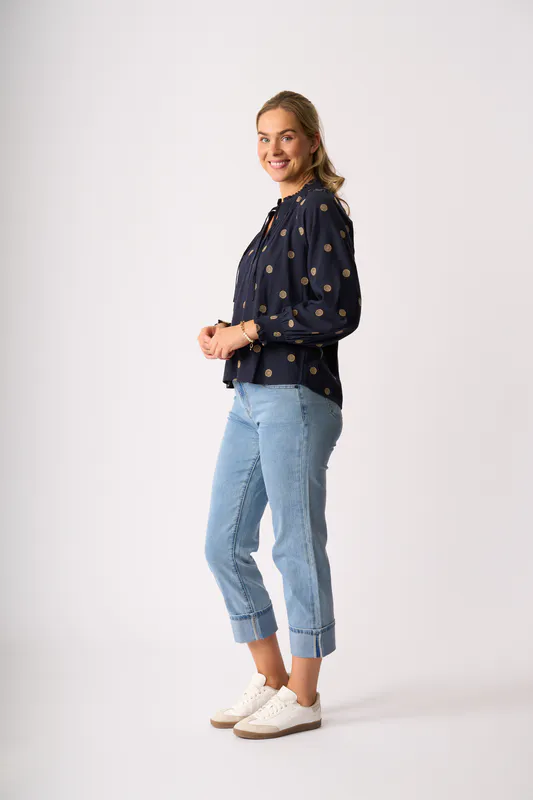 Model wearing Navy Spot Just Chillin' Top By Oh Three Available at Beetees Nelson
