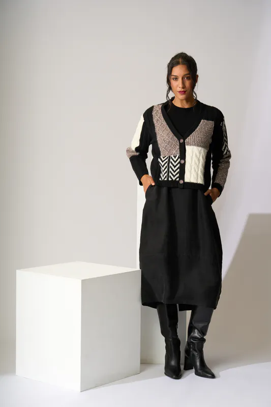 Model wearing Black Mix Cosy Cable Cardigan By Cardigan Available at Beetees Nelson