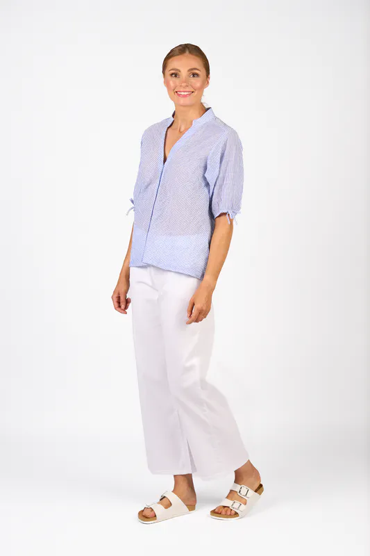 Model wearing Spin Jean Link Shirt By Knewe Available at Beetees Nelson
