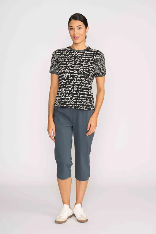 Model wearing Black & Ecru T-Shirt- Contrast Rib By Memo Available at Beetees Nelson