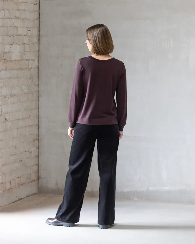 Model wearing Berry Remy Merino Top By Vassalli Available at Beetees Nelson