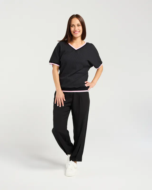Model wearing Black Rona Top By Seduce Available at Beetees Nelson