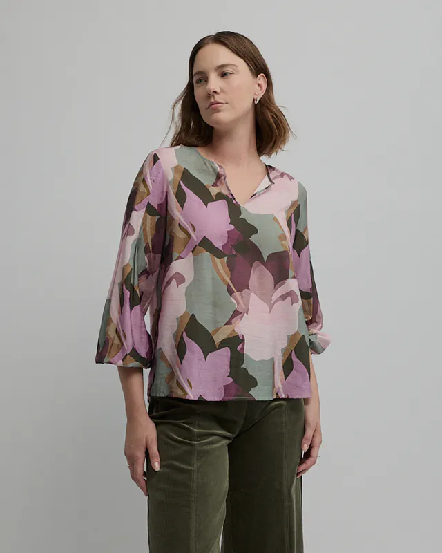 Model wearing Mystical Print Mystical Blouse By Yarra Trail Available at Beetees Nelson