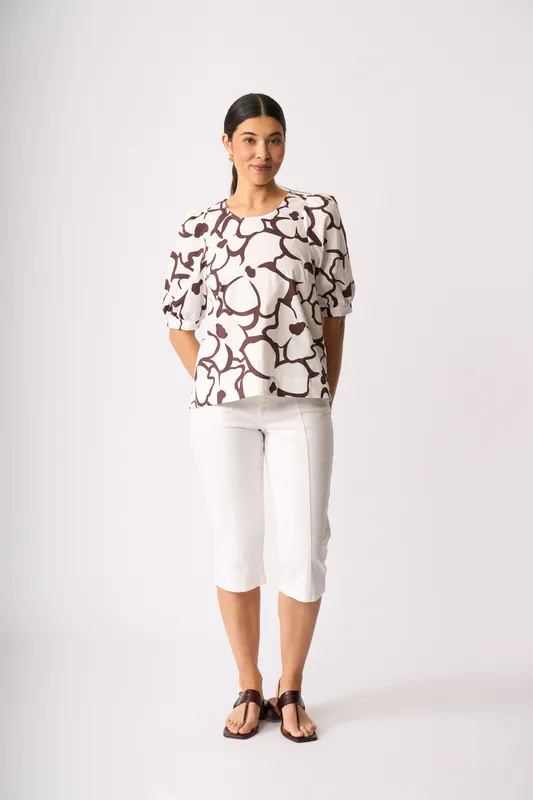 Model wearing Upsa-Daisy Scoop Neck Swing Top By Foil Available at Beetees Nelson