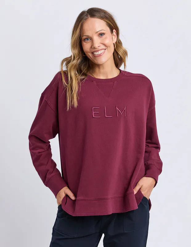 Model wearing Plum Established Crew By Elm Available at Beetees Nelson