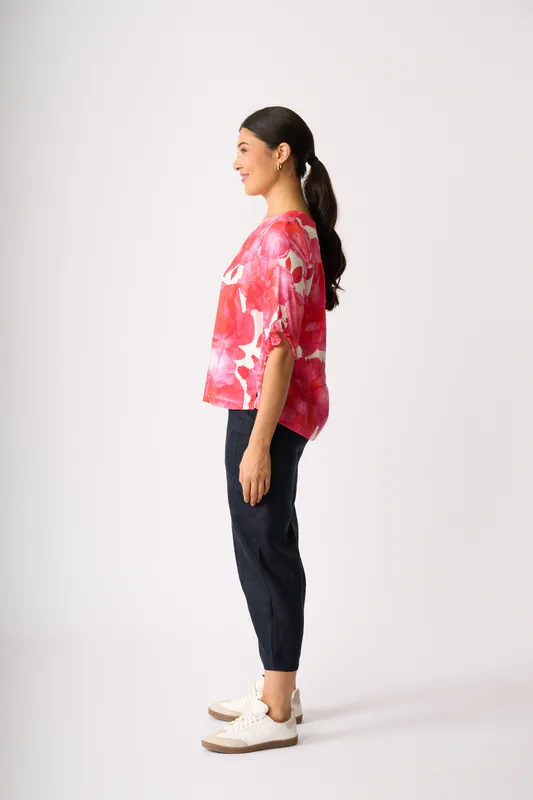 Model wearing Fantasia Ruffle Sleeve Scoop Top By Foil Available at Beetees Nelson