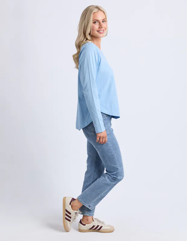 Model wearing Light Blue Everyday Long Sleeve By Elm Available at Beetees Nelson