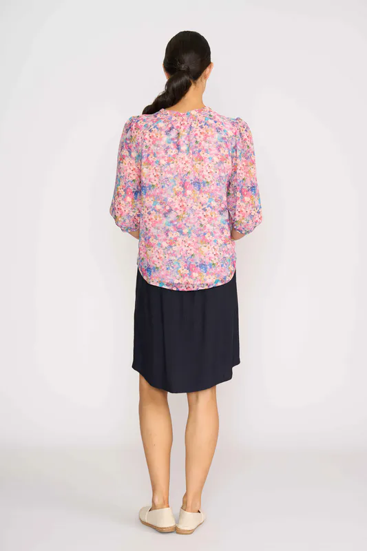 Model wearing Confetti Floral Scoop Neck Blouse By Memo Available at Beetees Nelson