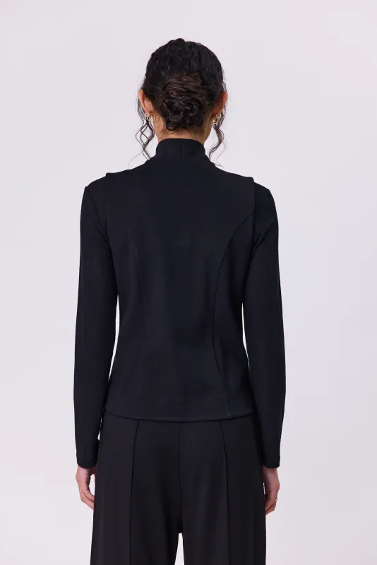 Model wearing Black Olive Batten Vest By Navy & Co. Available at Beetees Nelson