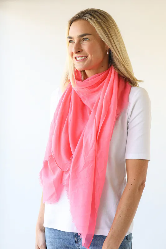 Model wearing Peachy Pink Vibrant Plain Scarf By Archer House Available at Beetees Nelson