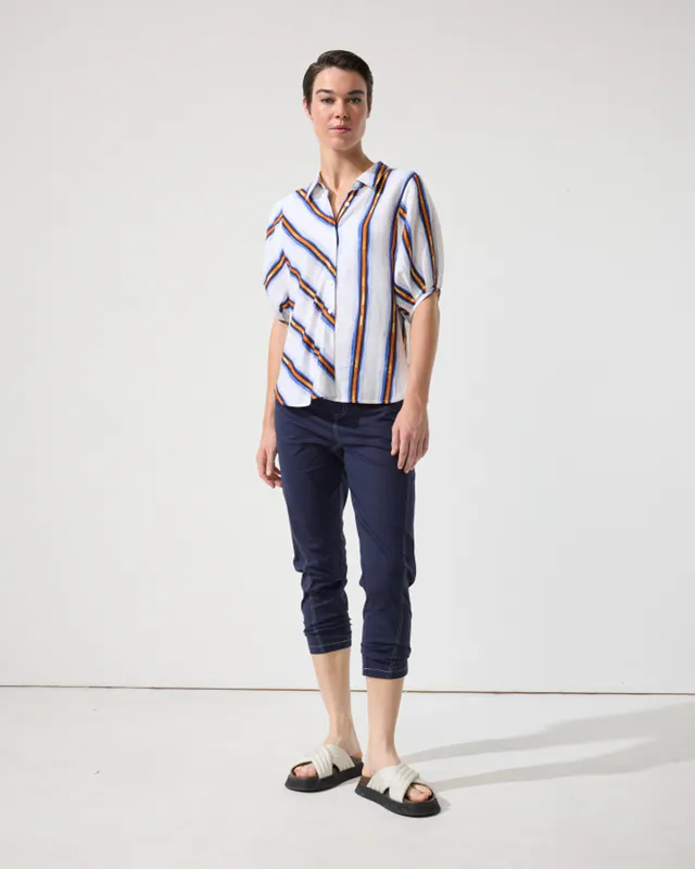 Model wearing Ink Essential Slim Pant By Marco Polo Available at Beetees Nelson