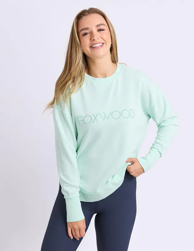 Model wearing Neon Blue Simplified Crew By Foxwood Available at Beetees Nelson
