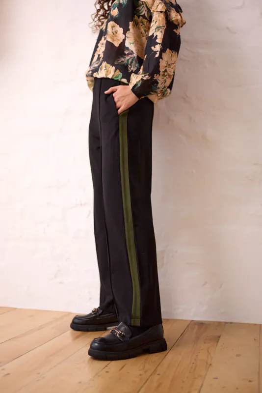 Model wearing Black Olive Batten Pant By Navy & No. Available at Beetees Nelson