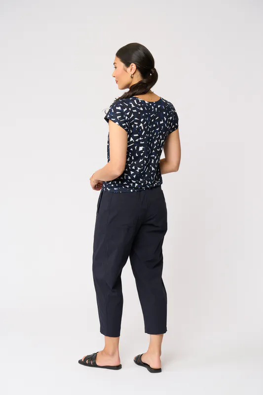 Model wearing Art Style Do The Twist Top By Foil Available at Beetees Nelson