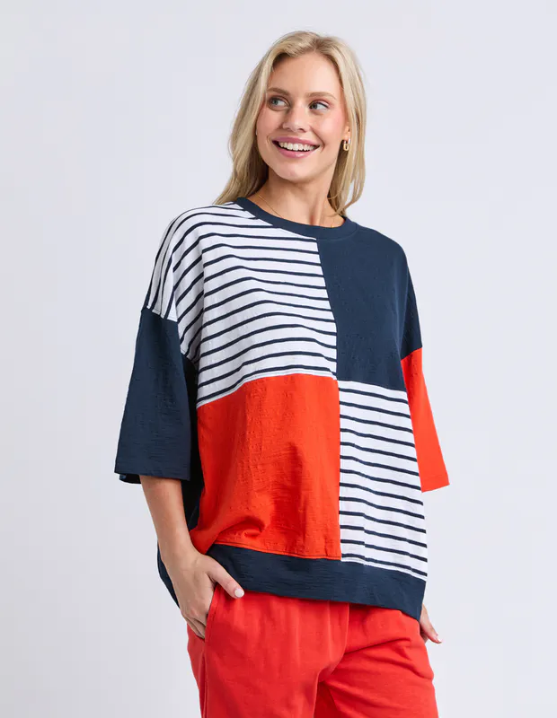 Model wearing Navy/Tangello Fig Sweat By Elm Available at Beetees Nelson