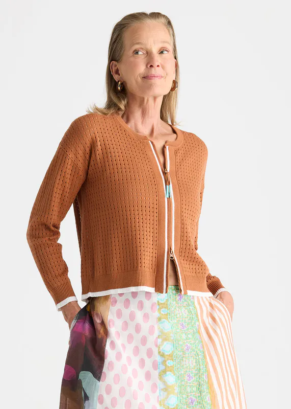 Model wearing Toffee Pointelle Zip Cardi By Zaket & Plover Available at Beetees Nelson