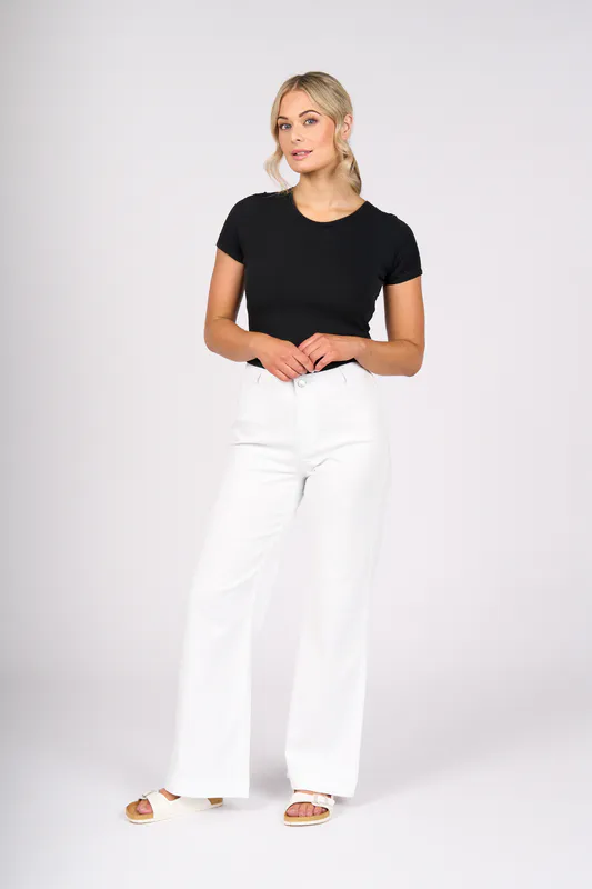 Model wearing White Denim Casa Jean By Vassalli Available at Beetees Nelson
