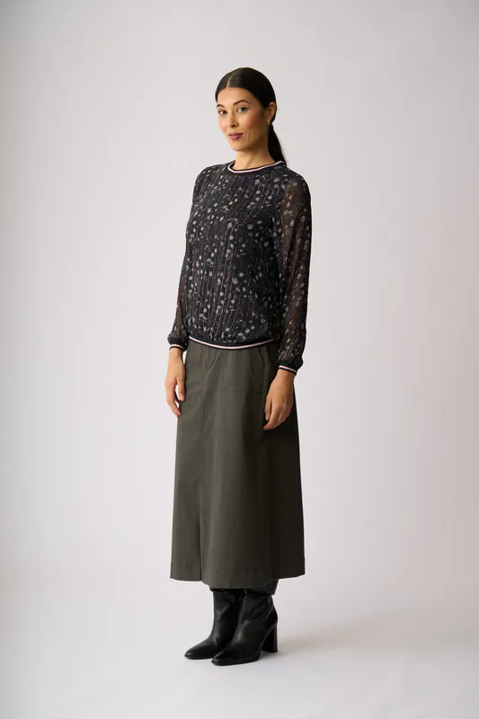 Model wearing Twilight Floral Sheer Sleeve, Rib Detail Top By Memo Available at Beetees Nelson