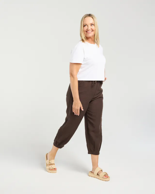Model wearing Brown Nova Pant By Seduce Available at Beetees Nelson