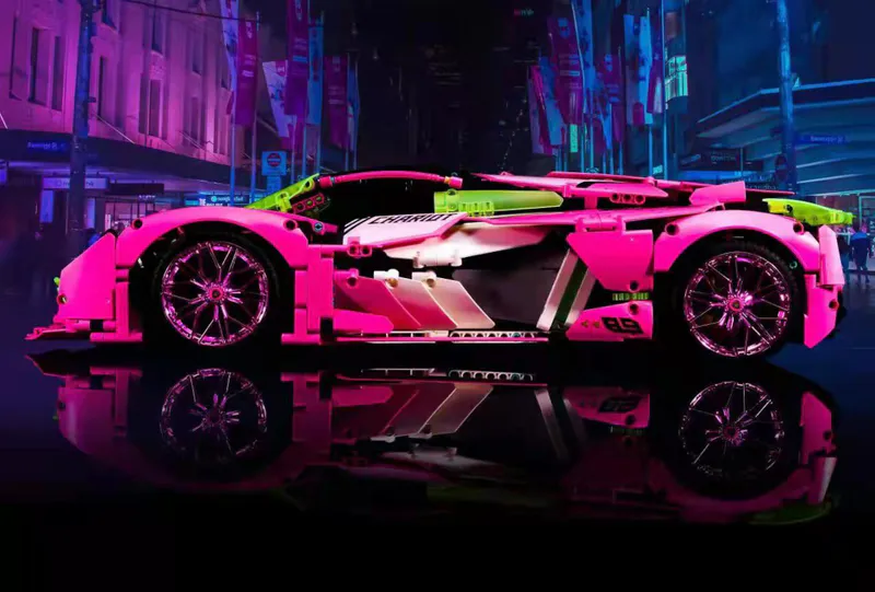 Amazing satisfying ultimate building block set for car enthusiasts - the pink Italian sports car! This sleek and stylish remote-controlled toy features real shock absorbers for an authentic feeling