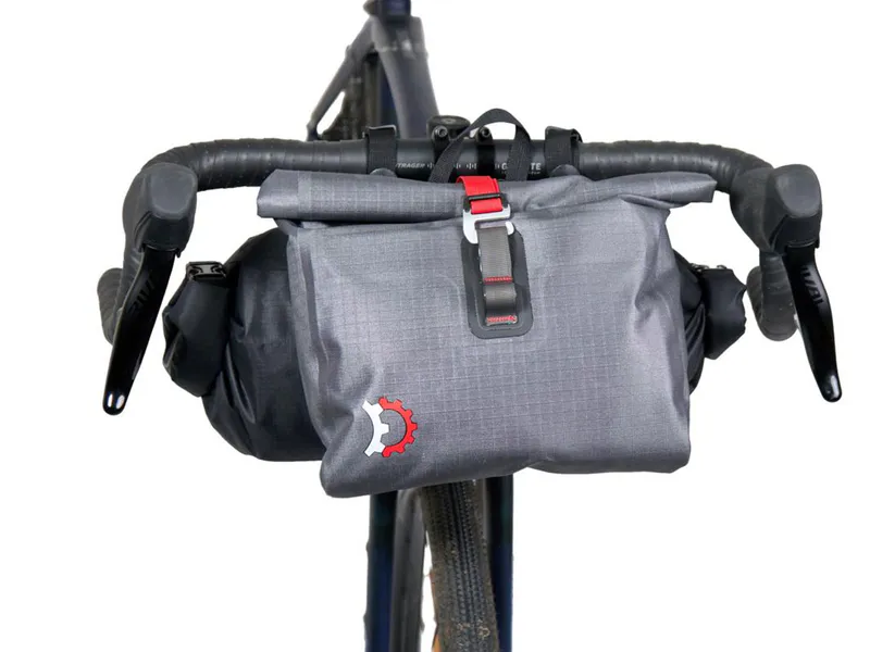 Revelate Designs Egress Pocket - installed on drop bars with handlebar roll