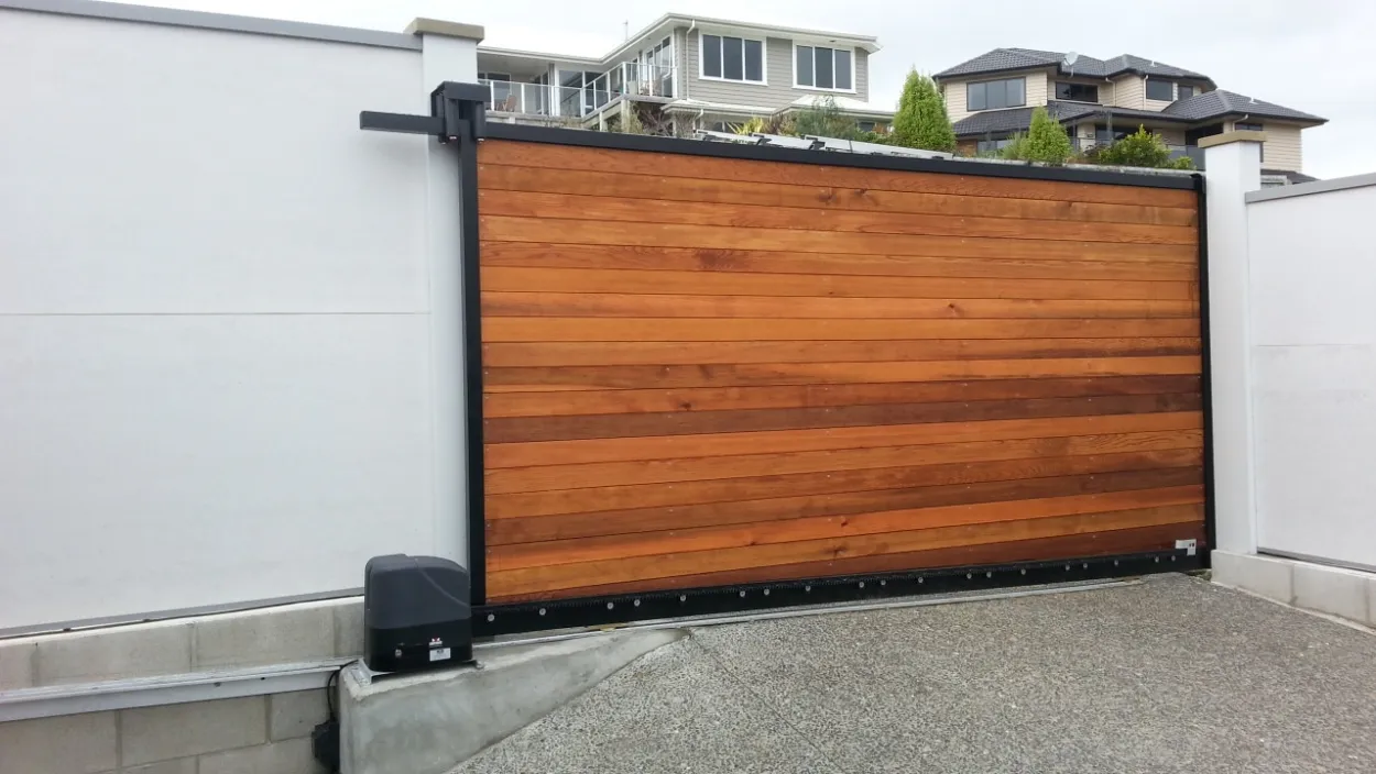 Wood added to a recessed internal frame sliding gate