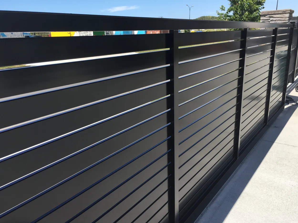 The rear (or house side) or a horizontal slat gate