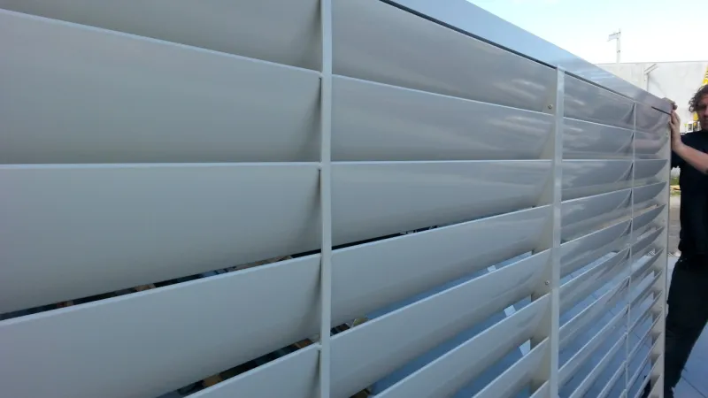 Rear or house side of a louvre gate showing the vertical support strips that are used on some longer louvre gates