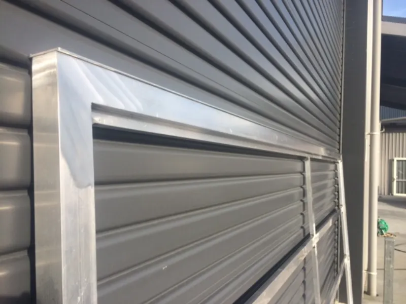 Showing the 25mm recessed step that is part of EasyGate's custom frame only profile, along with showing the 'rub rail' that can be added to a sliding gate.