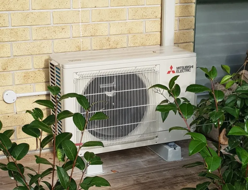 Before - heat pump with no cover