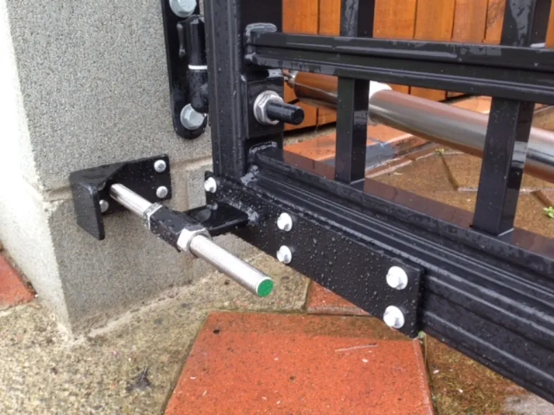 When the rod (that is attached to the gate) hits the post it acts as a stopper