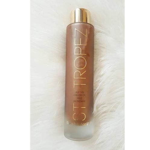 Tan your skin with St Tropez Self Tan Luxe Dry Oil at Elliott Skin & Beauty Nelson