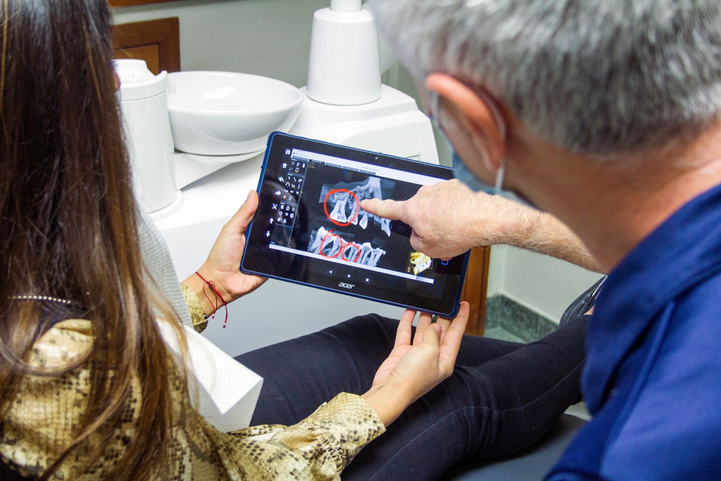 patient at the dentist discussing crowns and inlays