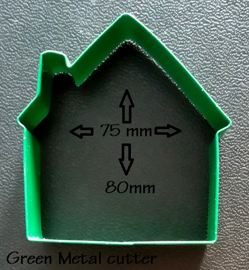 Green Metal house cutter used for Gingerbread stencils