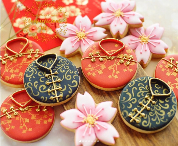 Cookielicious Cheongsam cookies using the ibicci Cherry Blossom Spray Feathered Swirl stencils