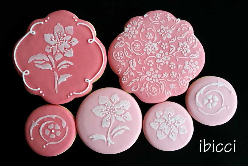 A collection of ibicci Lace Collection Flower stencilled cookies
