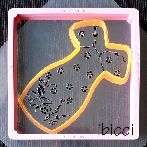 ibicci Lace Dress stencil in a Genie Frame with cutter underneath
