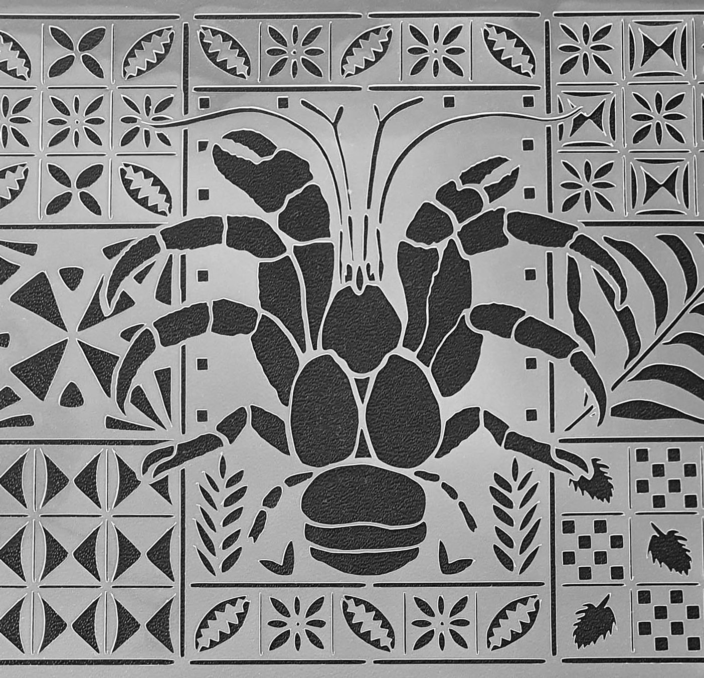 Closeup of the ibicci Niuean Uga Panel stencil
