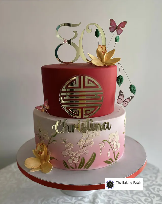 Photo of The Baking Patch cake using the ibicci 3 Orchid Panel stencil in 2 parts