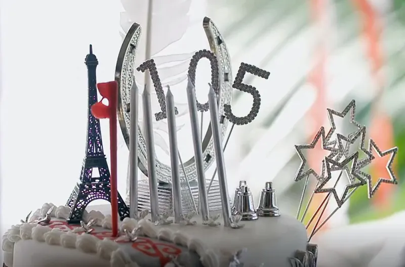 Closeup Photo of Isey Cross's 105th celebration birthday cake showing the ibicci DS Maori strip stencil design