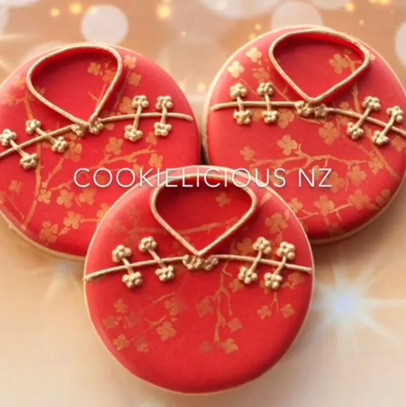 Cookielicious Red Cheongsam cookies using ibicci Cherry Spray 1 part stencil