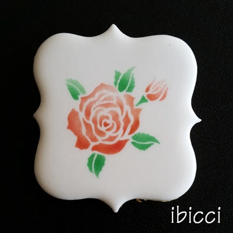 ibicci cookie airbrushed using the Rose with Bud 2 part stencil