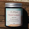 jar of mineral toothpaste with hydroxyapatite myrrh and mastika resins
