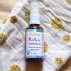 A bottle of Calming Baby Oil